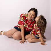 Happy Santa Red Kids Shirt featuring festive holiday patterns; matching adult red festive shirt included. | Tropicool Clothing