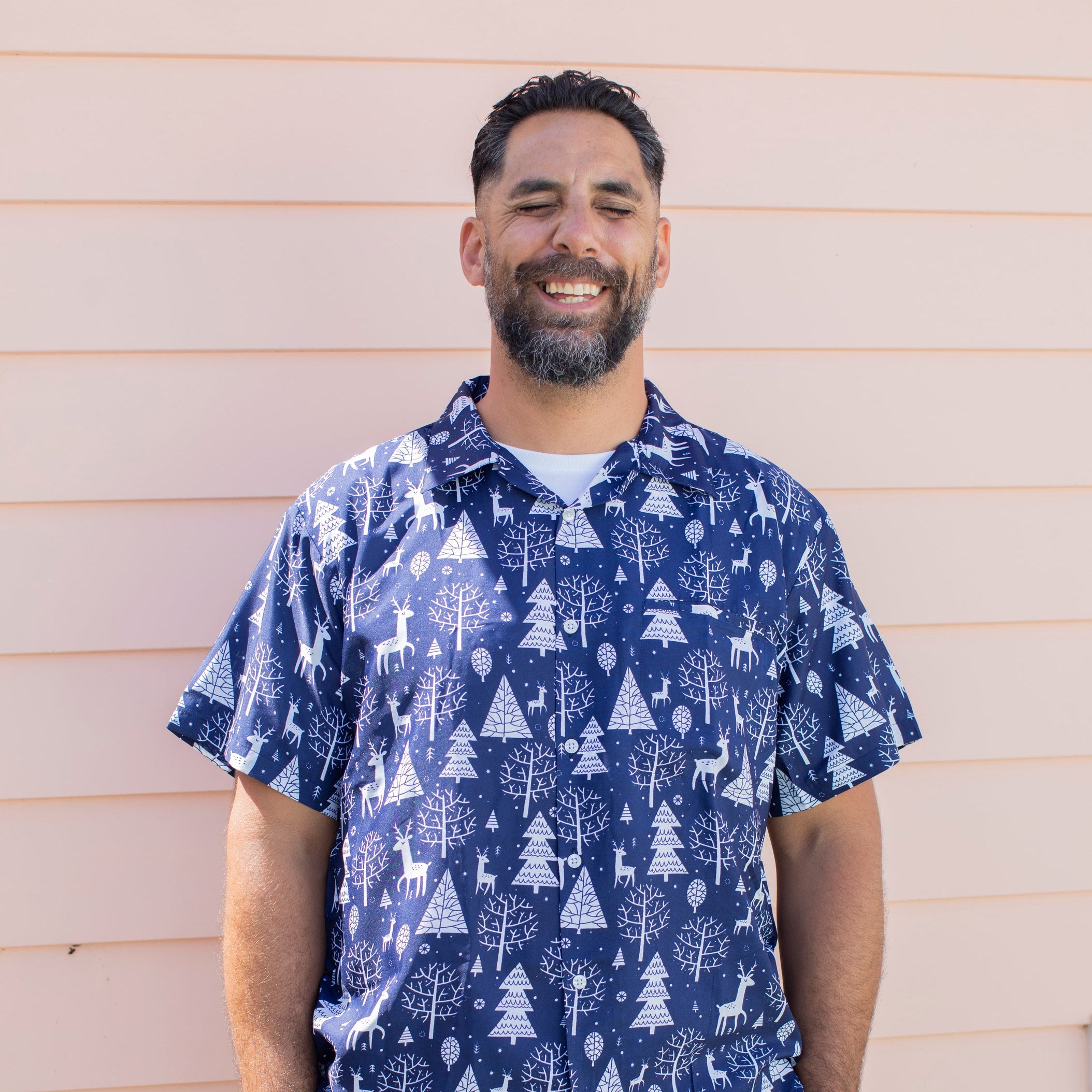 Navy blue adult Christmas shirt with reindeer pattern, festive tropical holiday apparel style. | Tropicool Clothing