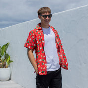 Gingerbread Jest Christmas shirt with festive gingerbread pattern, short sleeves, holiday tropical style. | Tropicool Clothing