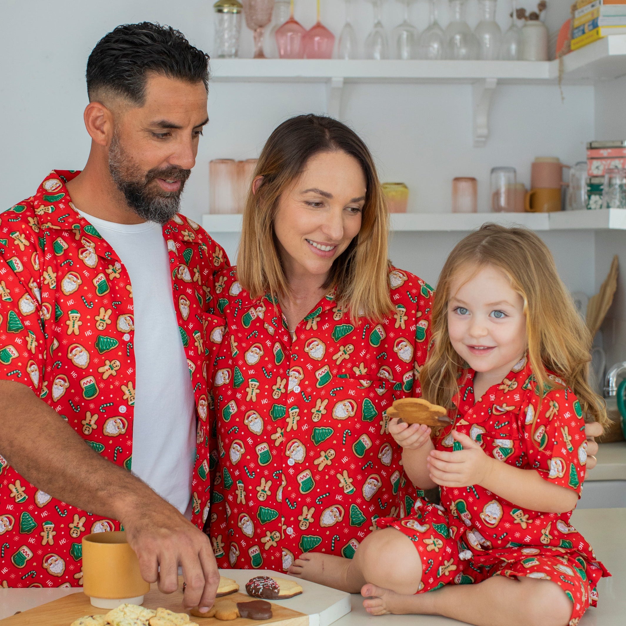Matching red pajamas and Gingerbread Jest Christmas shirts with festive gingerbread print. | Tropicool Clothing