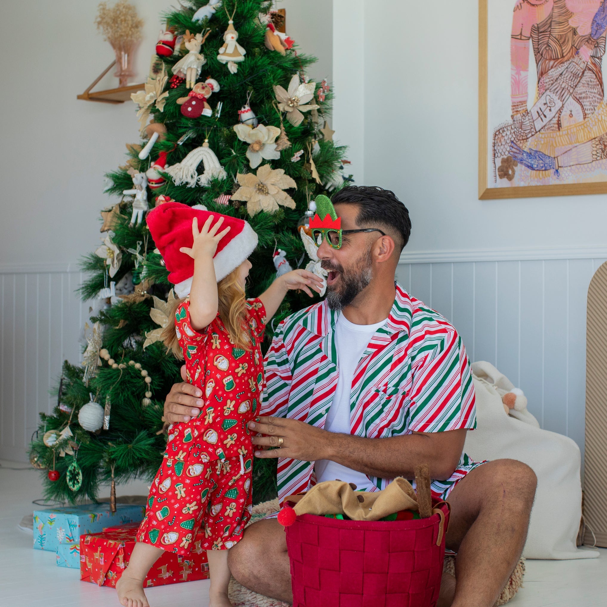 Jolly Stripe Christmas adult shirt featuring red, white, and green stripes; festive holiday tropical style. | Tropicool Clothing