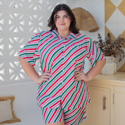 Jolly Stripe Christmas adult shirt with red, green, and white festive stripes; paired with matching shorts. | Tropicool Clothing