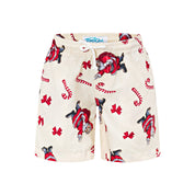 Beige kids shorts with elastic waistband, Santa Claus, candy canes, and red bows festive pattern. | Tropicool Clothing