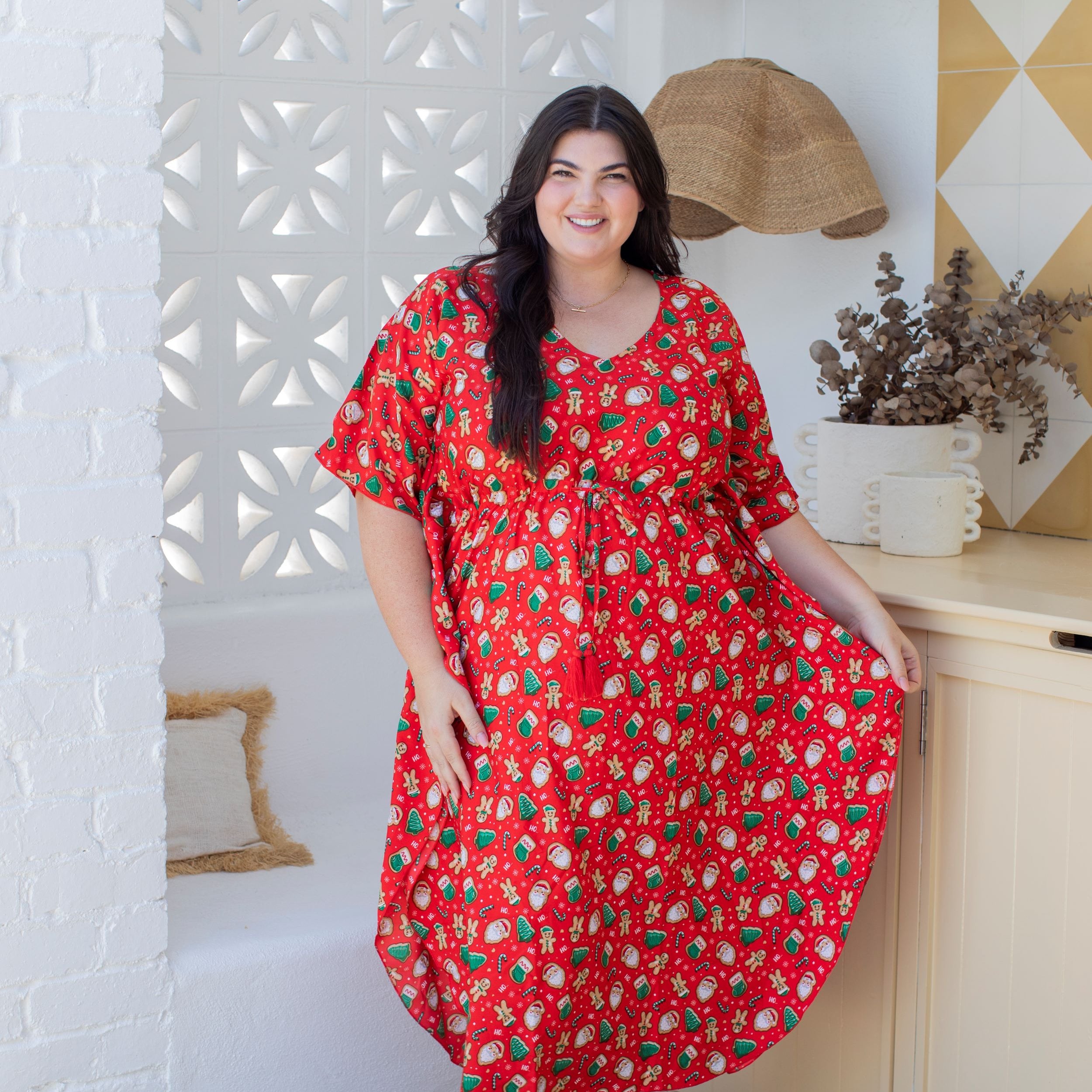 Gingerbread-patterned Christmas kaftan in festive colors, loose fit, perfect for holiday resort wear. | Tropicool Clothing