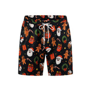 Christmas shorts with gingerbread men, Santa, candy canes, mugs; colorful festive holiday pattern. | Tropicool Clothing