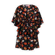 Black kaftan kimono dress with Santa, gingerbread men, gifts, and wreaths festive holiday prints. | Tropicool Clothing