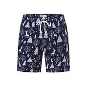 Navy Christmas shorts with white reindeer and tree print, white drawstring; festive tropical style. | Tropicool Clothing
