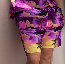 Sunset purple adult shorts and matching Hawaiian shirt with tropical sunset, palm tree, and ocean prints. | Tropicool Clothing