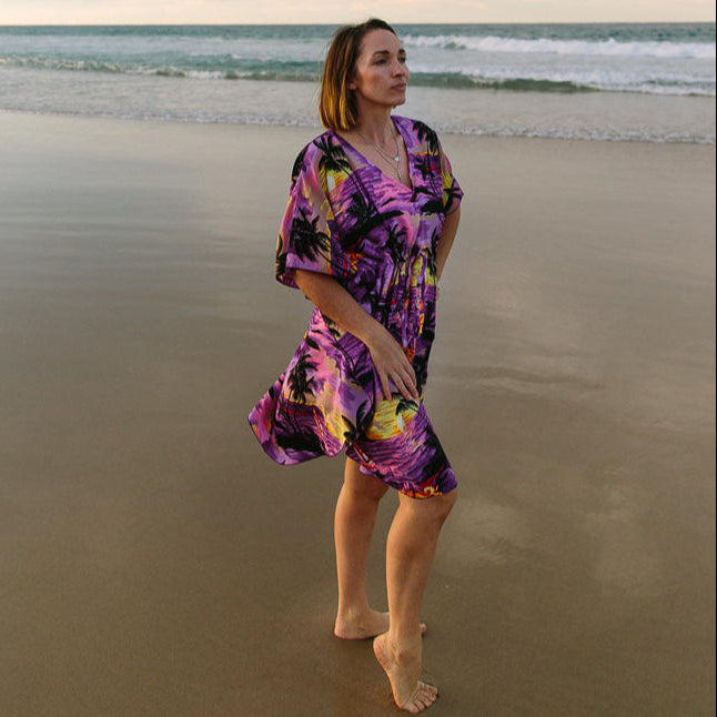 Sunset purple kaftan with flowing tropical style, ideal for festive beach or resort wear. | Tropicool Clothing