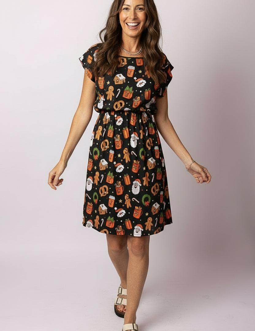 Woman wearing Tropicool Alice Jingleverse Christmas Adult Dress – black festive print with Rick and Morty prints.  Perfect for Christmas parties