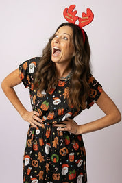 Woman wearing Tropicool Alice Jingleverse Christmas Adult Dress – Festive Rick and Morty theme. Perfect for Christmas parties