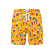 Yellow shorts with white drawstring, featuring cartoon Santas, pineapples, and tropical holiday patterns. | Tropicool Clothing